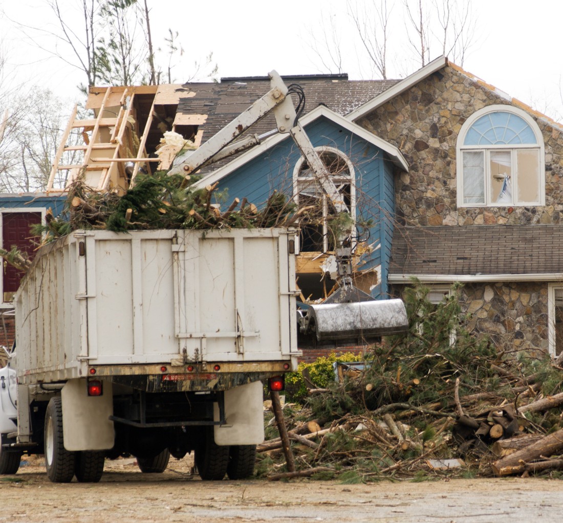 Storm Cleanup damaged house