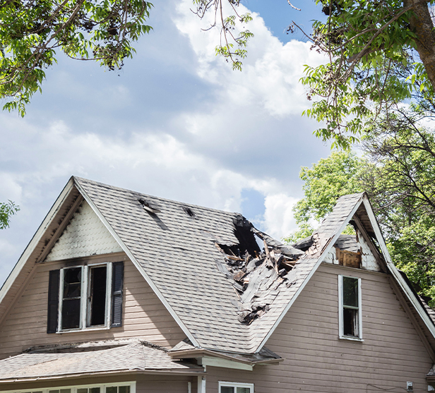 House with damaged roof